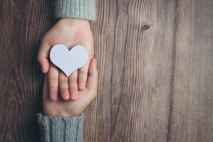 Individuals spreading kindness and helping others thrive.